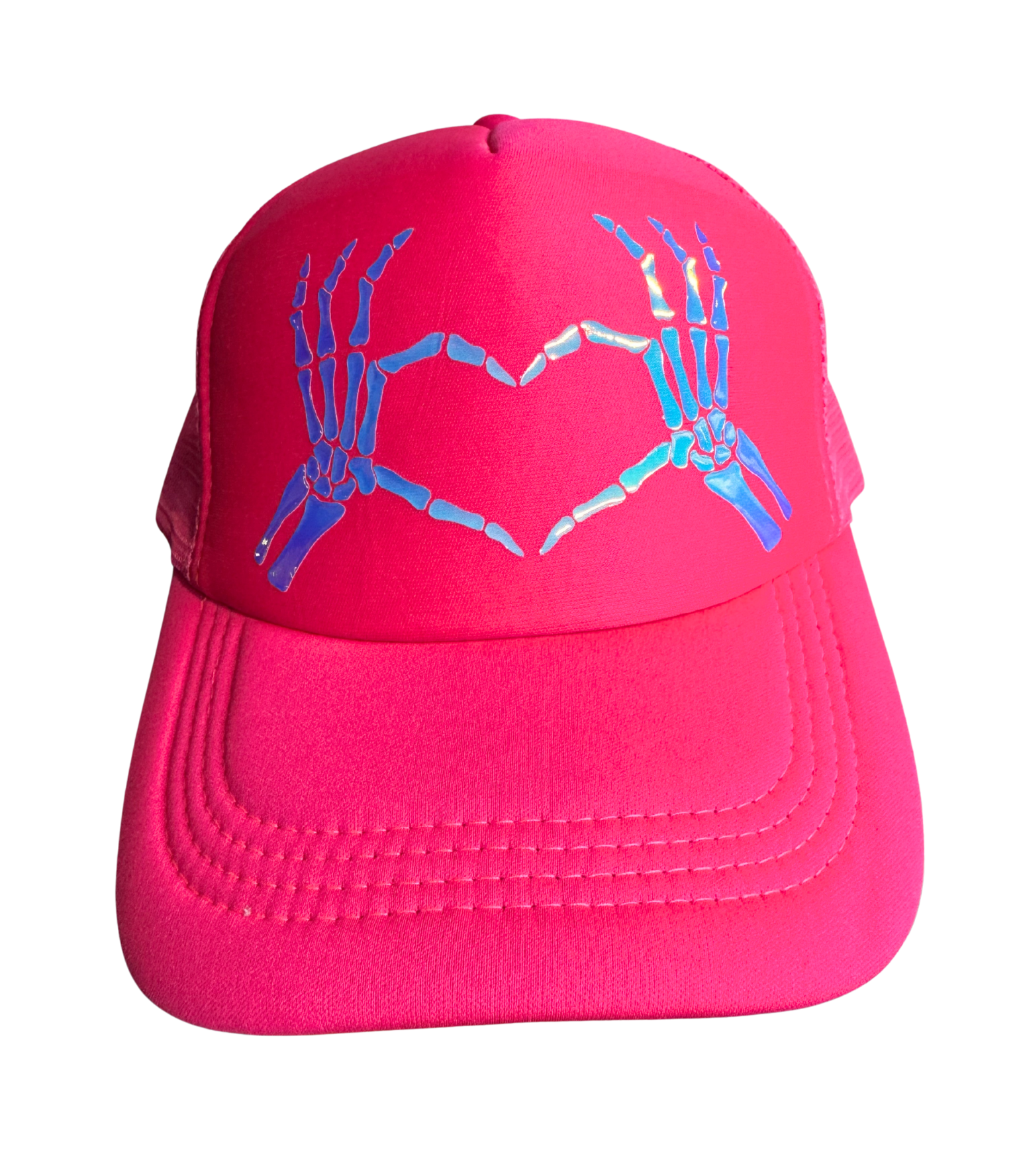 Pink cap with skeleton hands design on a white background