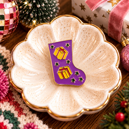 Purple Christmas stocking enamel pin festive hero image