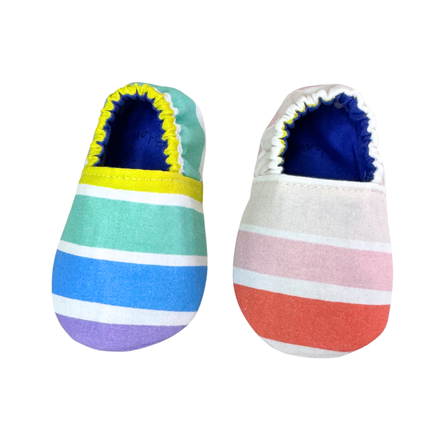“Front view of handmade baby shoes with rainbow stripes in pastel and bright colors, size 3–6 months”

