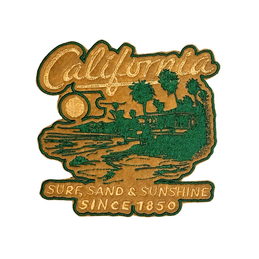 Embroidered patch that says "California – Surf, Sand & Sunshine Since 1850" with palm trees and beach scene
