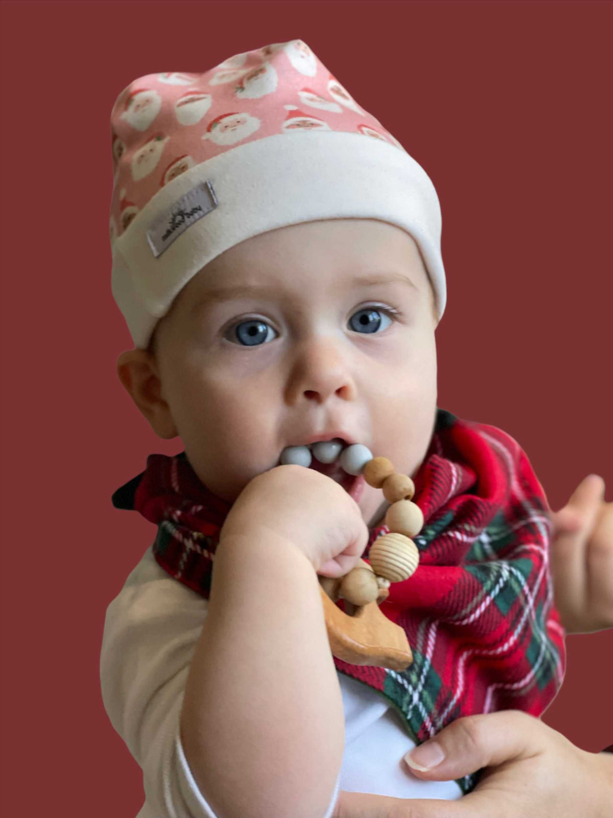 Original lifestyle view of reversible bib-dana
