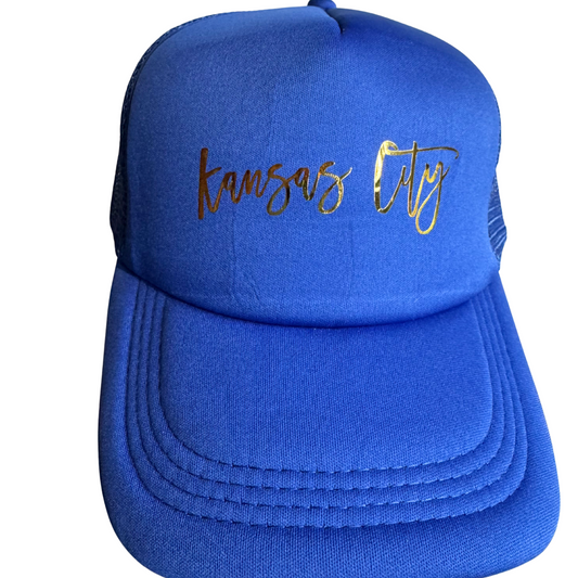 Blue cap with 'Kansas City' text on a white background