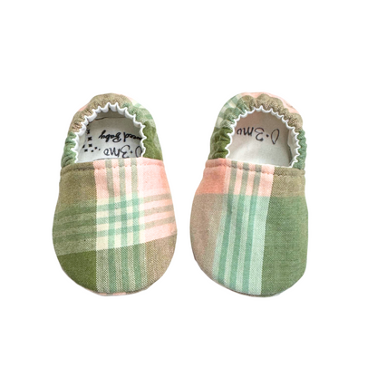 Sage plaid baby moccasins original front view, size 0–3 months