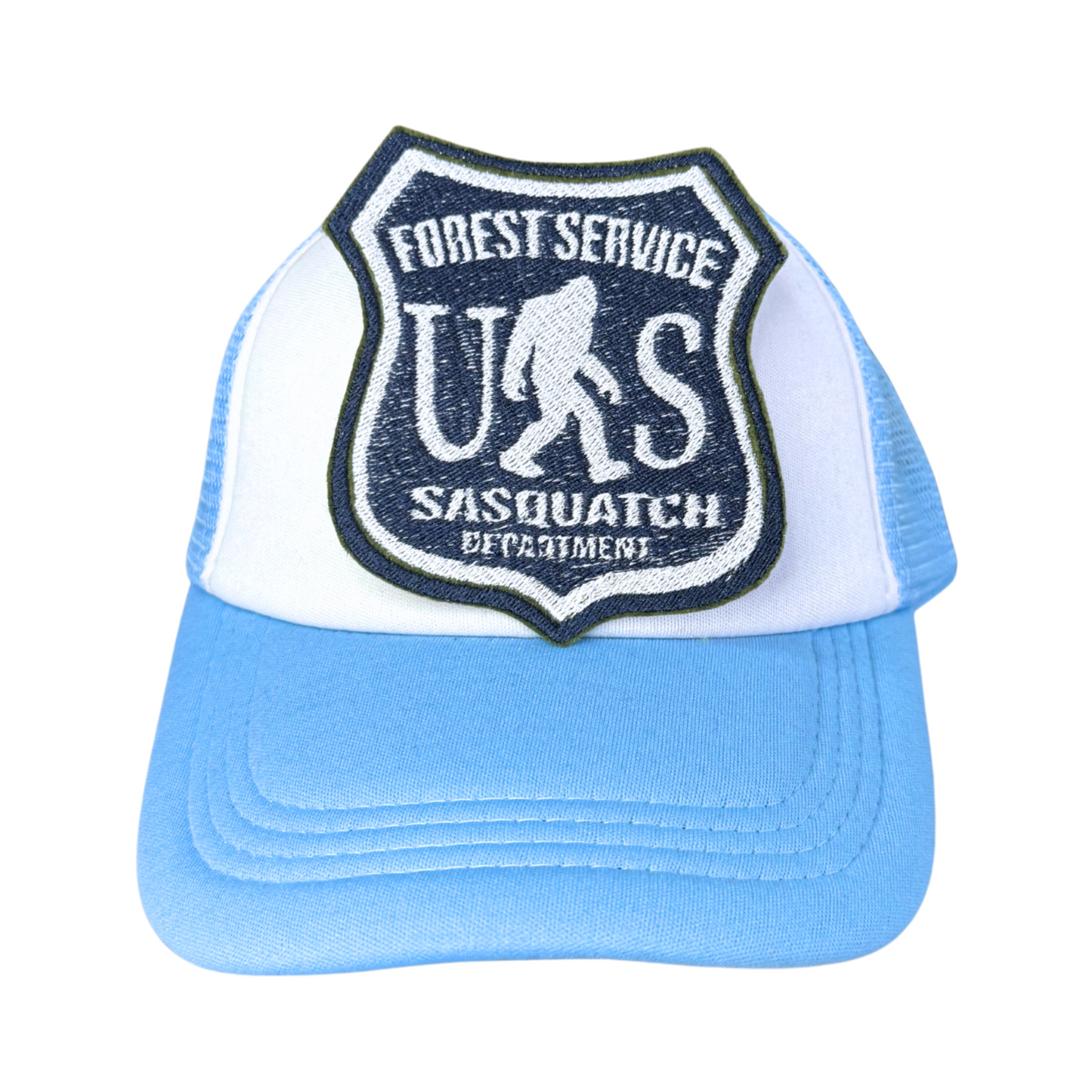Sasquatch Forest Service embroidered patch attached to a light blue and white trucker hat.
