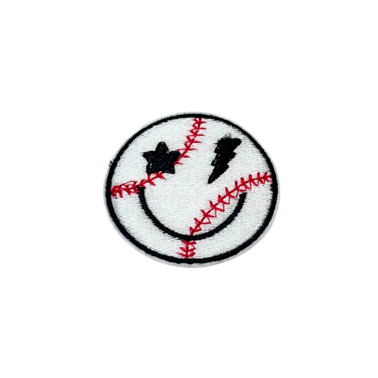 White embroidered patch shaped like a baseball with red stitching, a curved smile, and one eye as a star and the other as a lightning bolt

