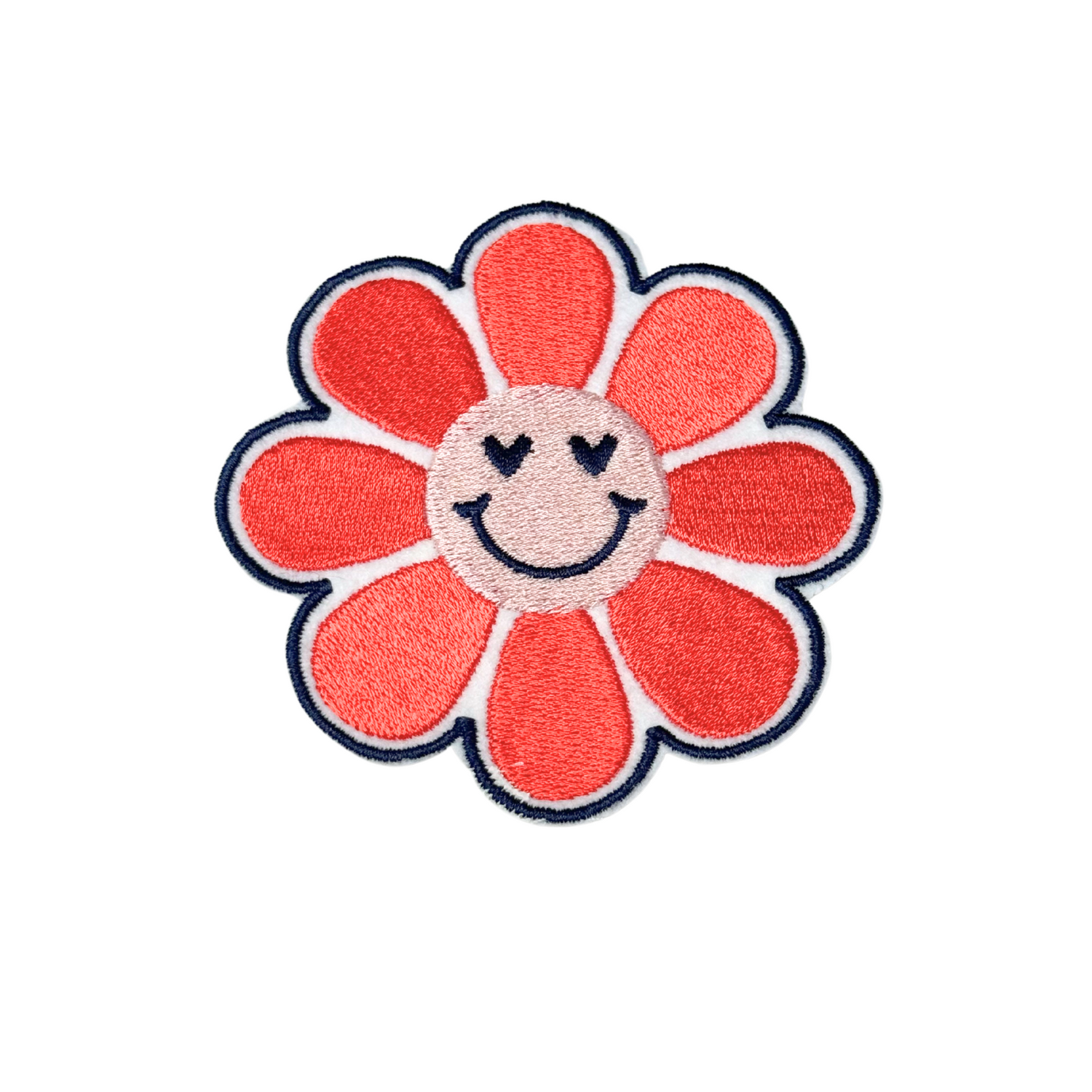 Front view of embroidered smiley flower patch with red and pink petals
