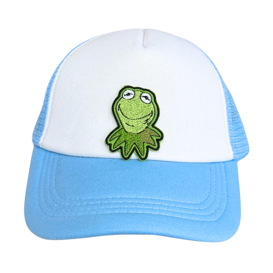 Light blue and white trucker hat with an embroidered frog patch attached.

