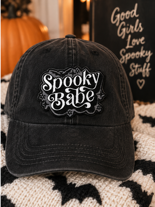 Spooky Babe embroidered patch styled on a black dad hat