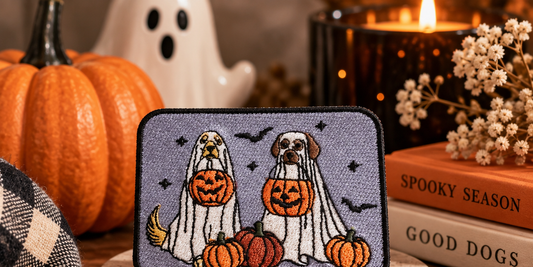 Spooky Pups embroidered Halloween patch styled with pumpkins and cozy spooky season decor