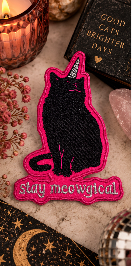Stay Meowgical black cat embroidered patch styled with crystals, candle and celestial decor