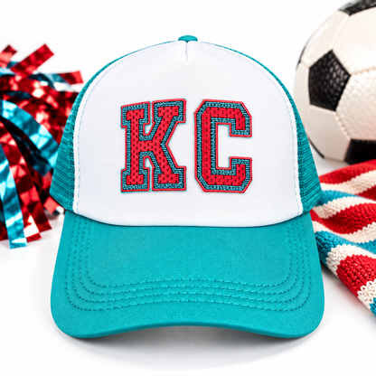 Teal and White KC Current Trucker Hat styled hero