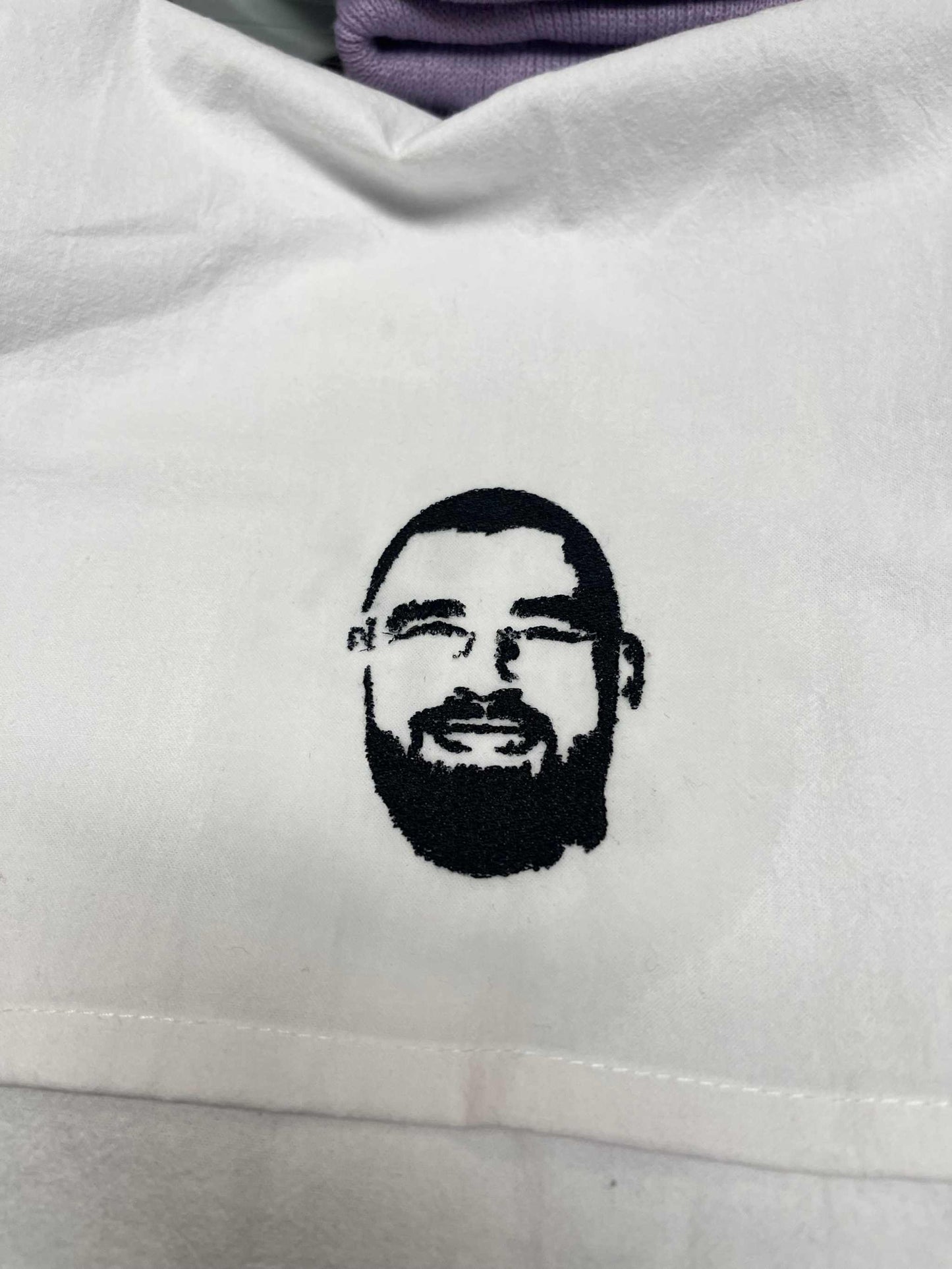 Extra large flour sack kitchen towel with embroidered face, customizable text option.