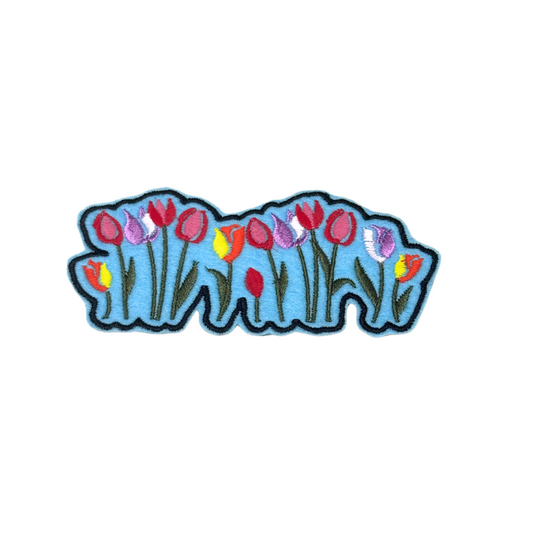 Hero shot of embroidered tulip patch on white background

