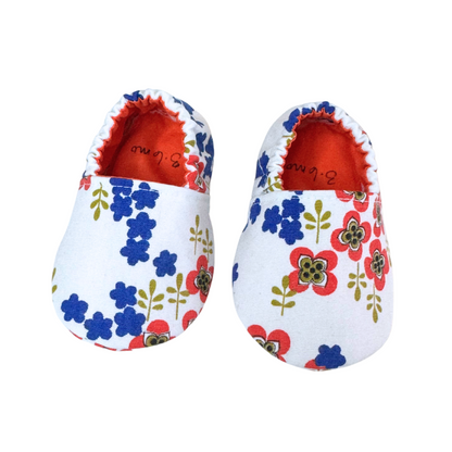 “Handmade soft sole baby shoes with upcycled vintage floral fabric, front view, 3-6 months”


