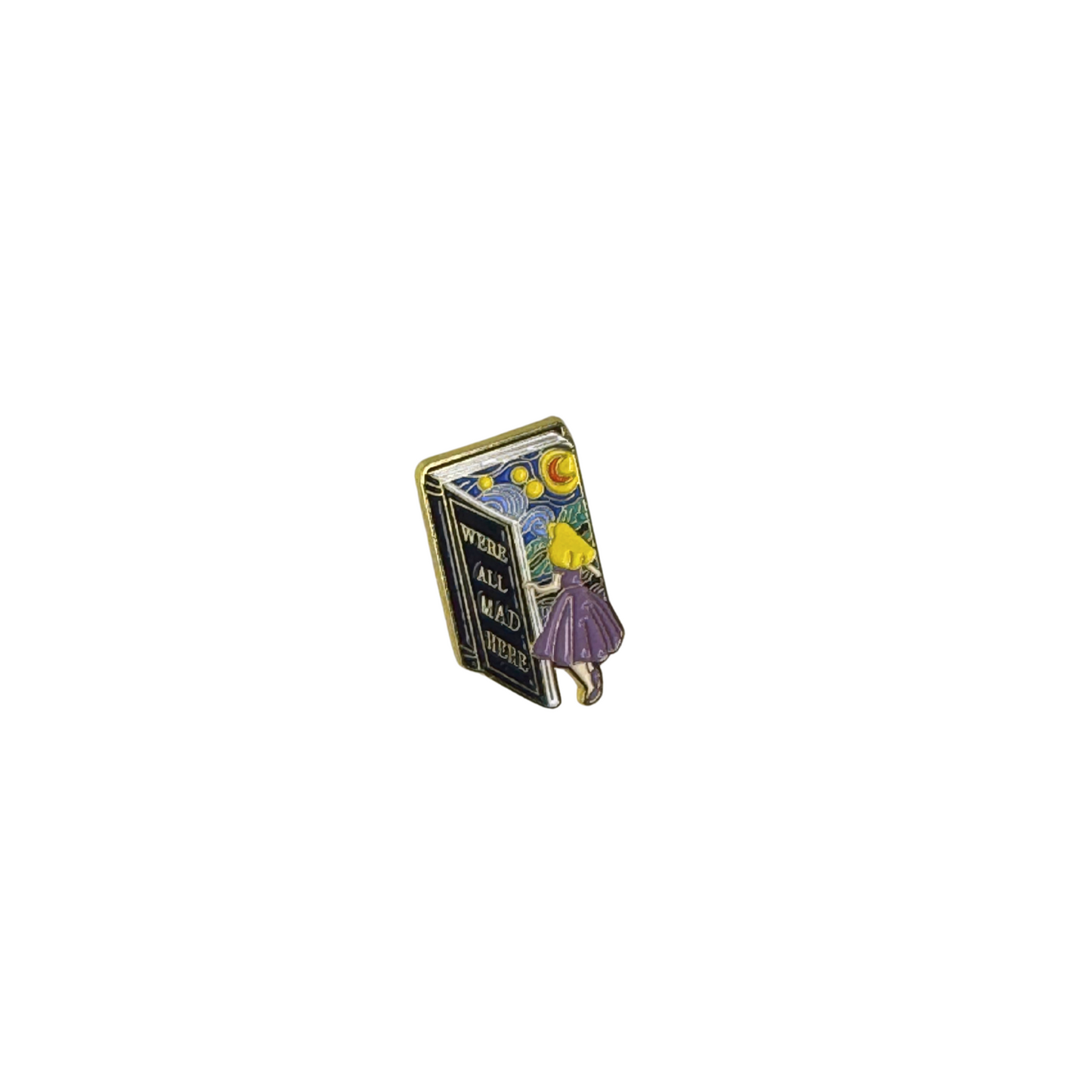 Enamel pin shaped like a storybook with Alice and the quote “We’re All Mad Here”