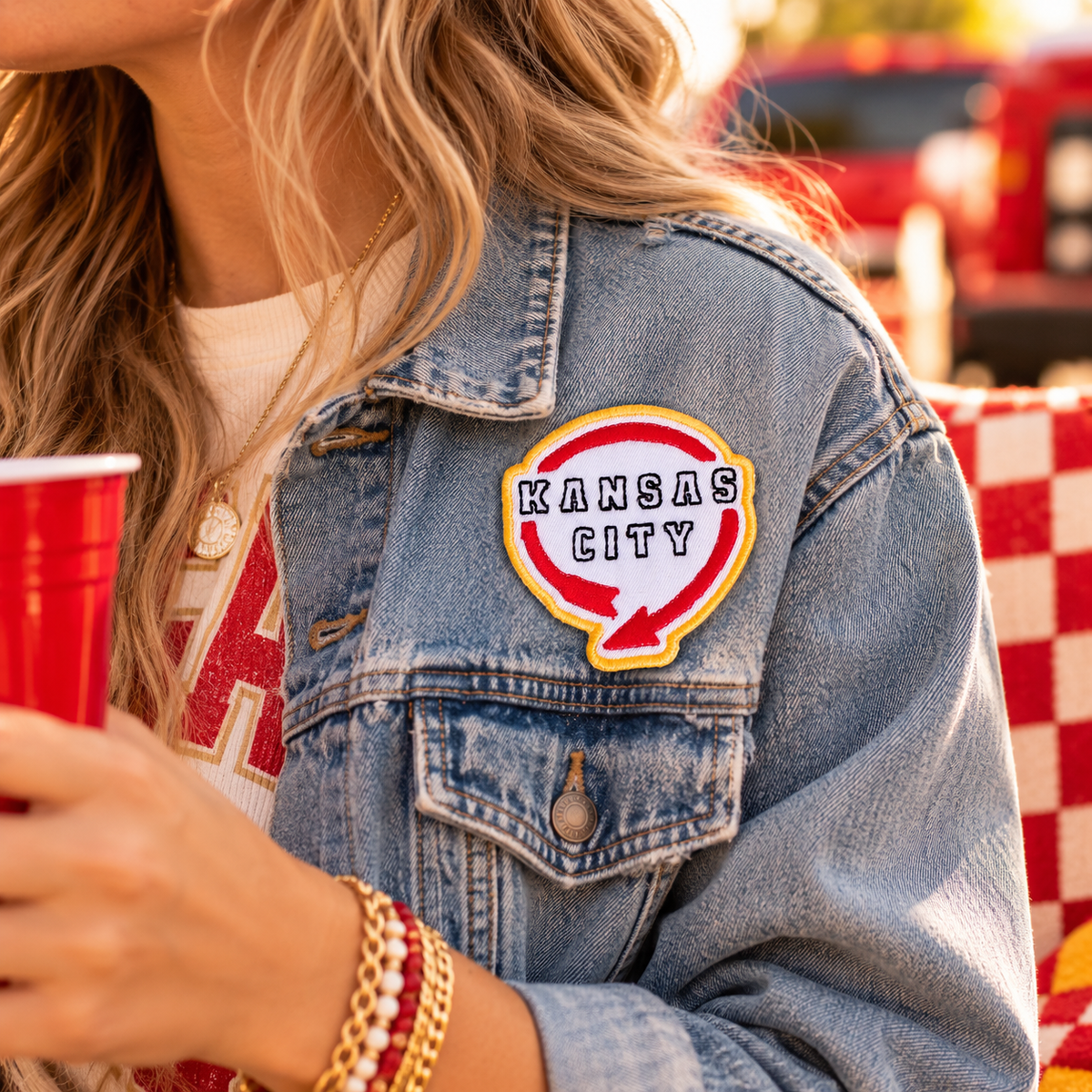 Kansas City Western Auto patch in Chiefs colors styled on denim jacket