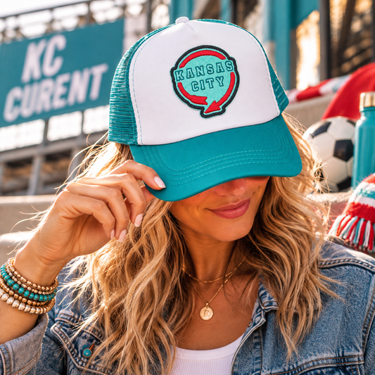 Western Auto KC Current Trucker Hat worn in a Kansas City soccer lifestyle scene