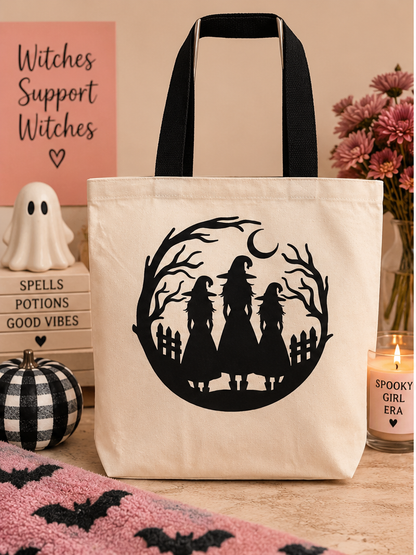 Witchy Halloween tote bag with three witches and crescent moon