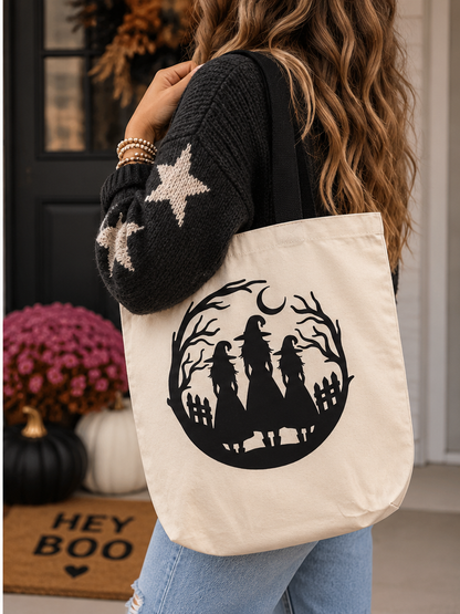 Woman carrying witchy Halloween canvas tote bag