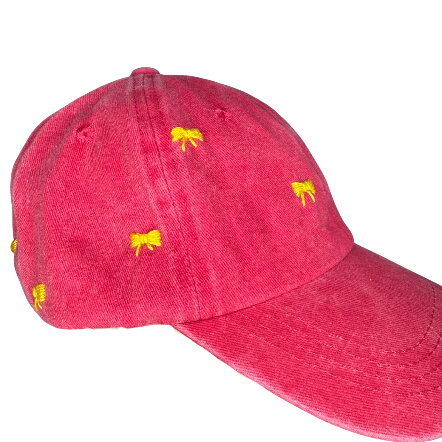 Red cap with yellow bows on a white background